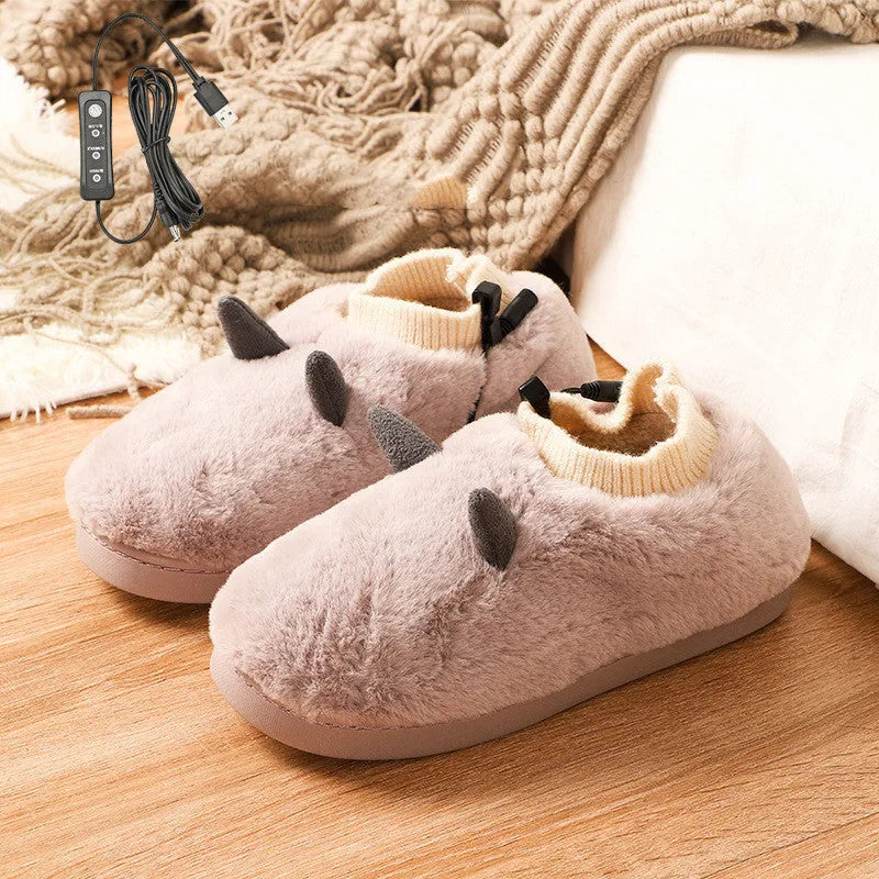 USB electric heating slippers in velvet, showing USB cable connection and adjustable temperature control.
