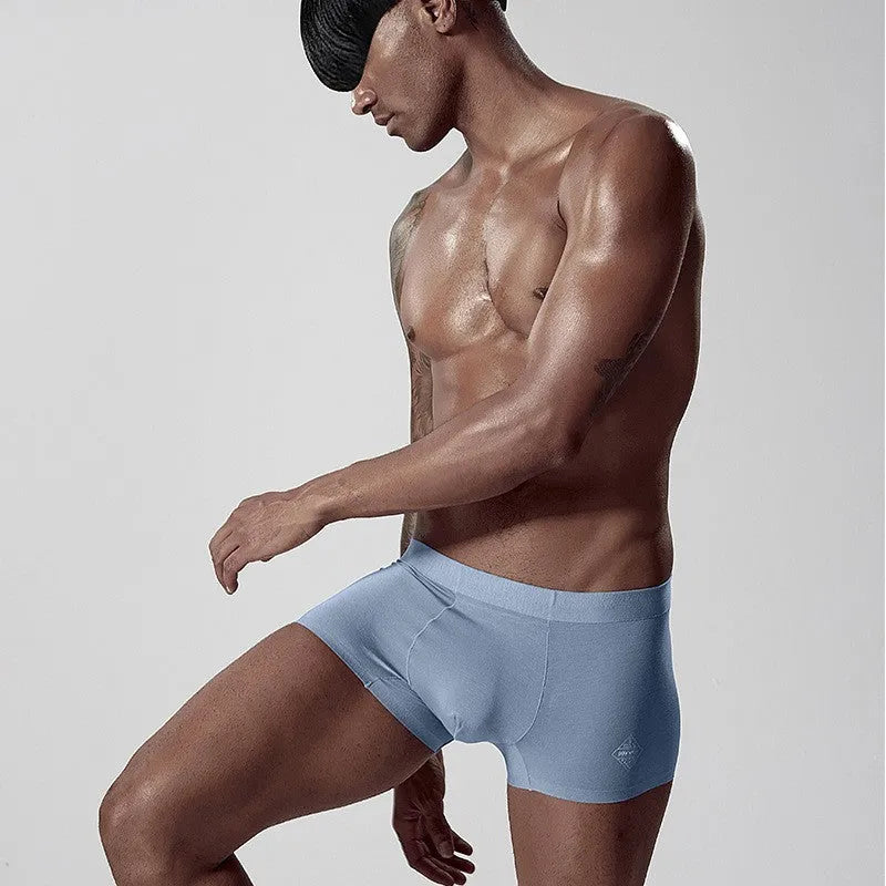 Seamless modal men's underwear in mid waist design showing white, pink and green colour options