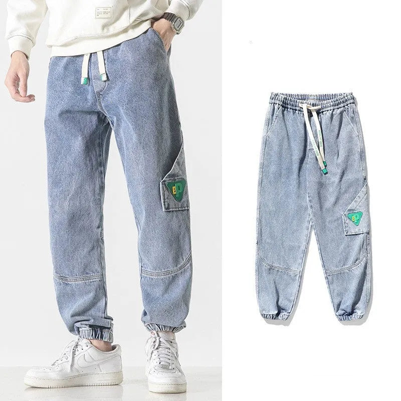 Men's cotton loose-fit tapered trousers in black, blue, or grey with mid-waist design