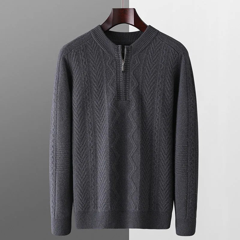 Man wearing a beige pure wool loose fit sweater with a diamond lattice pattern and a half-zip neck.
