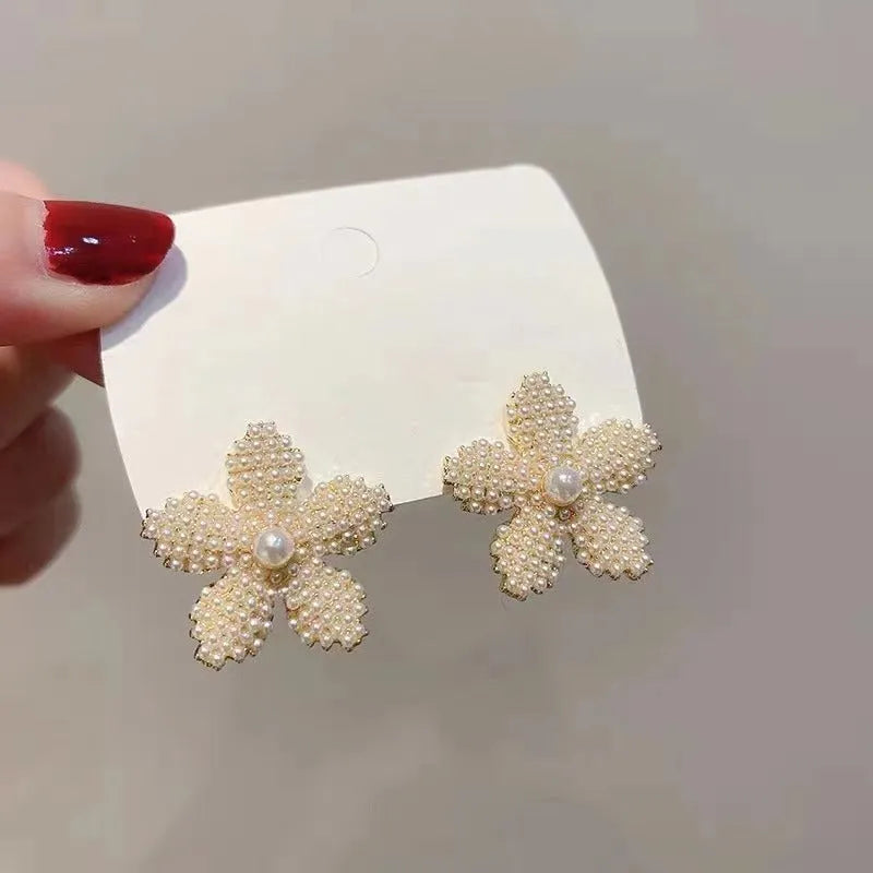 Korean-style alloy fruit earrings with inlaid stones in gold, pearl flower, silver, or starfish pearl finishes.