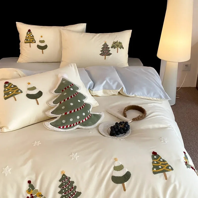 Pure cotton four-piece bedding set with embroidered Christmas tree pattern showing duvet cover, bed sheet and pillowcases