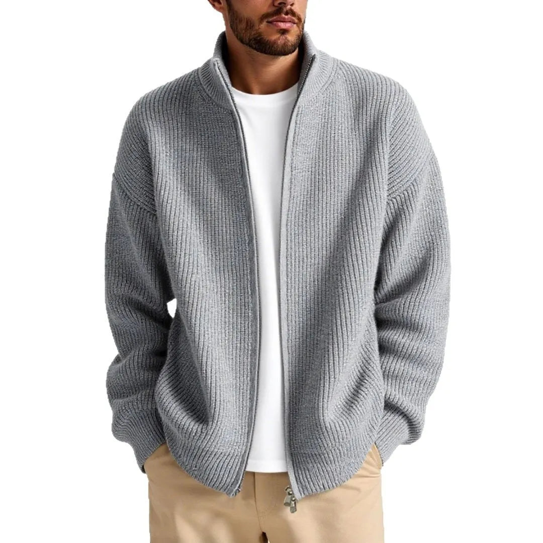 Men's loose grey cardigan sweater coat on hanger showing acrylic blend fabric texture