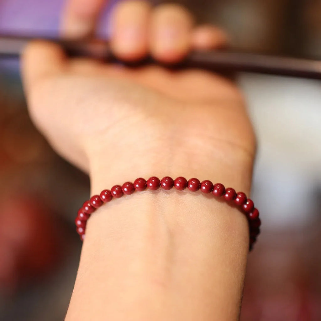 Handcrafted purple gold sand design cinnabar bracelet or anklet with geometric Chinese style patterns.