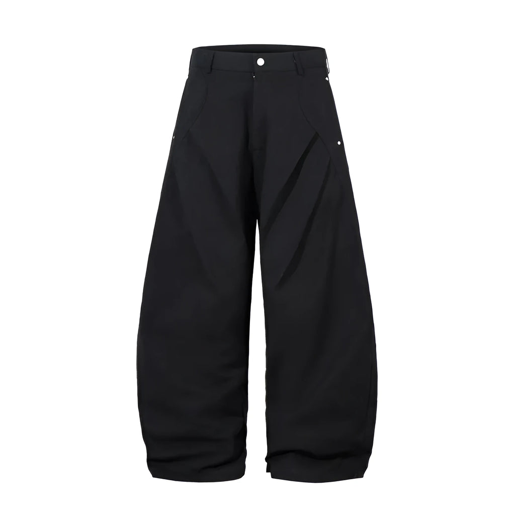Men's black cotton loose-fit wide-leg trousers with machete pleats and an elasticated waistband