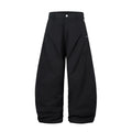 Men's black cotton loose-fit wide-leg trousers with machete pleats and an elasticated waistband