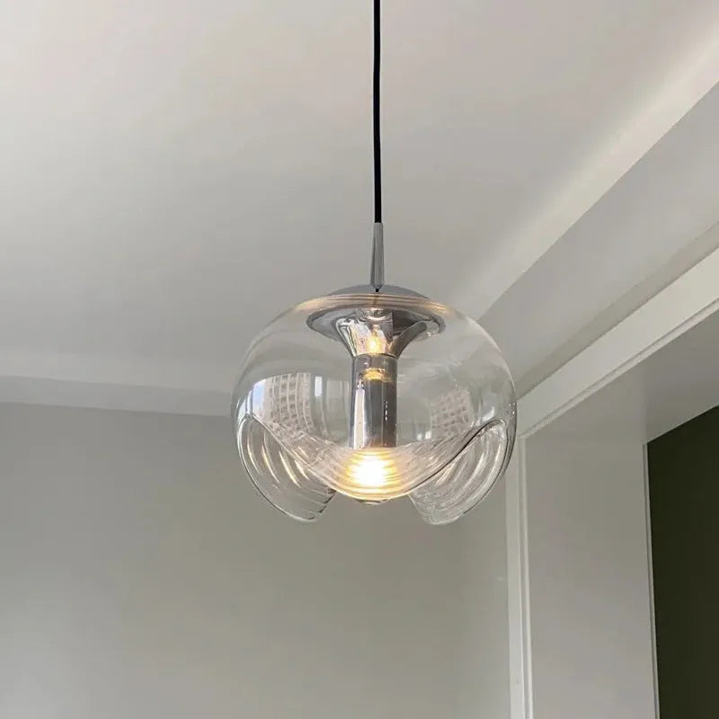 Modern minimalist glass bedside chandelier with 250mm diameter, shown in transparent, amber, and smoky grey colour options.
