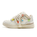 Creamy white retro skateboard shoes with lace-up design and platform sole