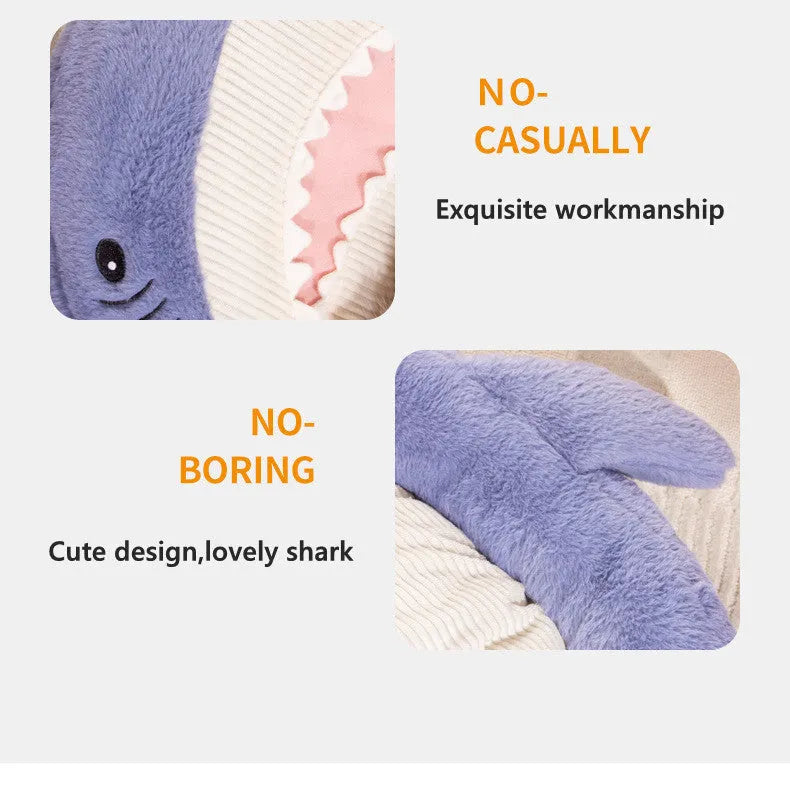 Blue shark pattern pet bed cushion for a small dog on a wooden floor