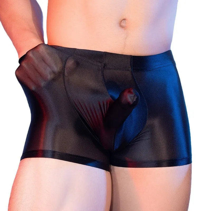 Men's red boxer shorts with an elephant nose pattern, showing mid-waist and seamless design.
