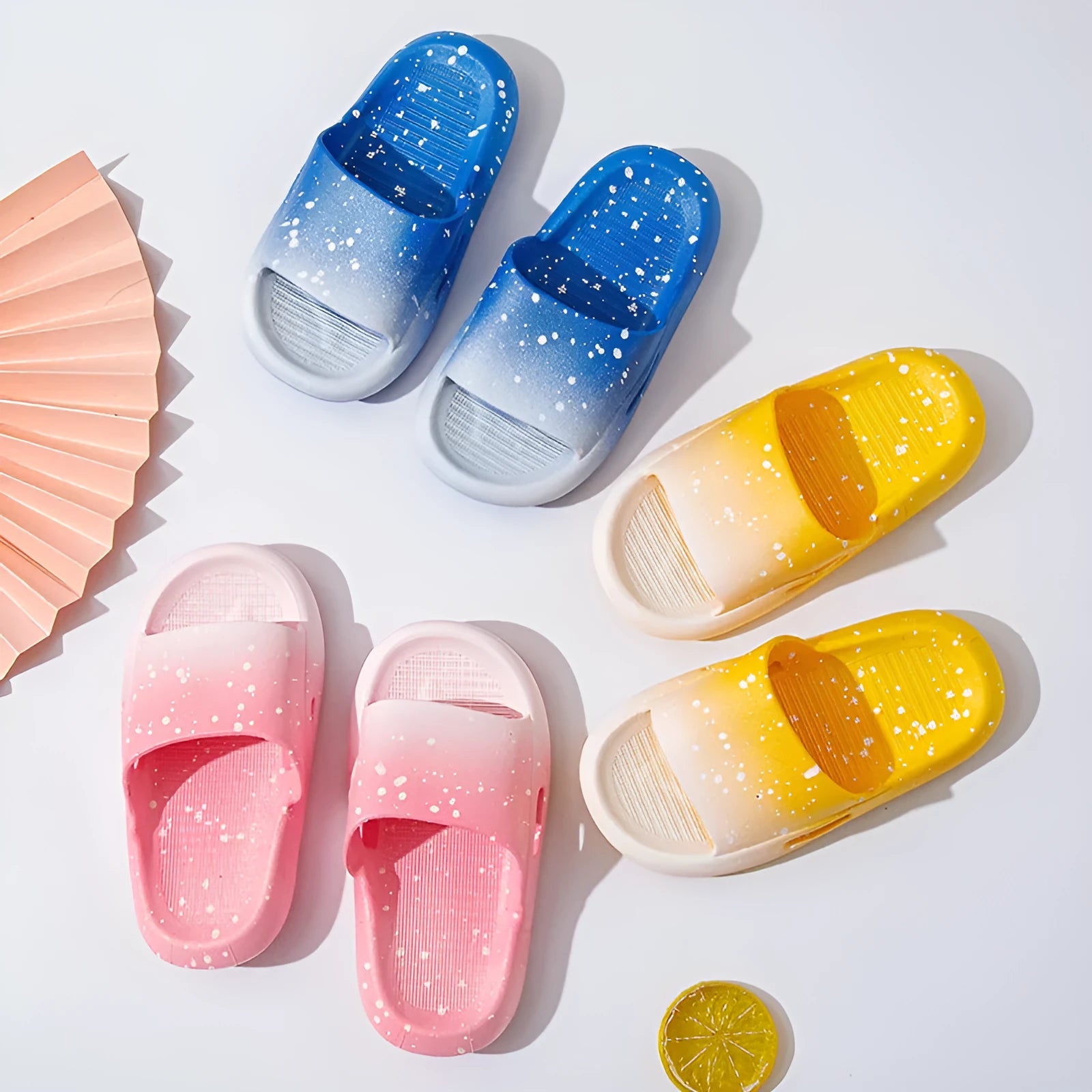 Gradient colour PVC slippers for children on a white background, showing European style design.