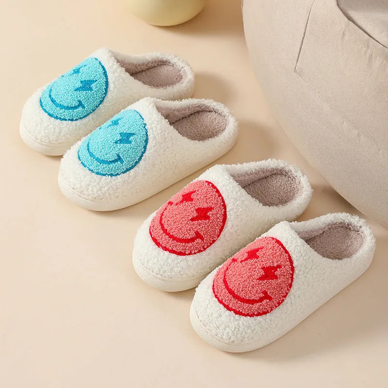 Women's plush cartoon love style home slippers with a non-slip PVC sole.