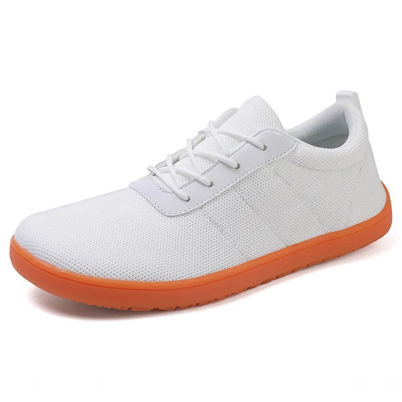 Men's black Flyknit walking shoes with wide round toe and flat rubber sole on a white background.