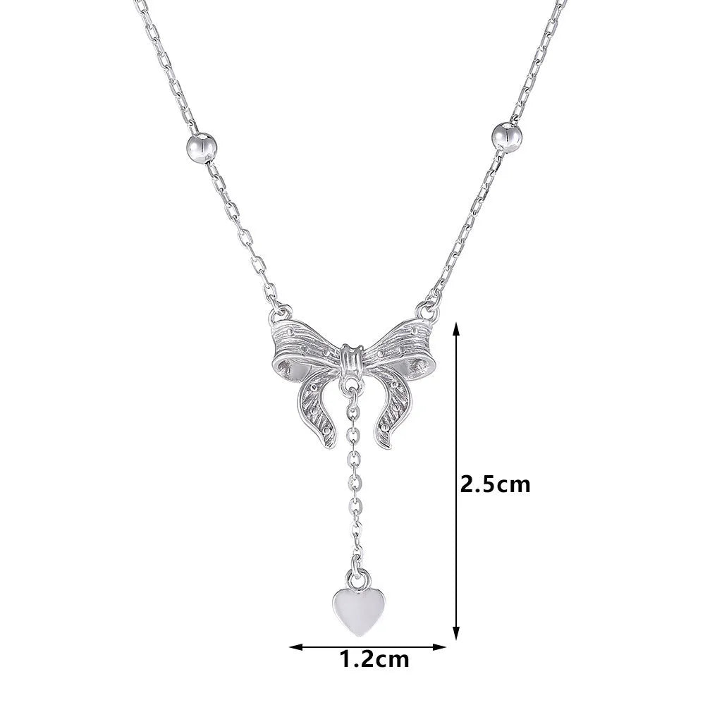 S925 silver necklace with heart and bow pendant on an O-ring chain