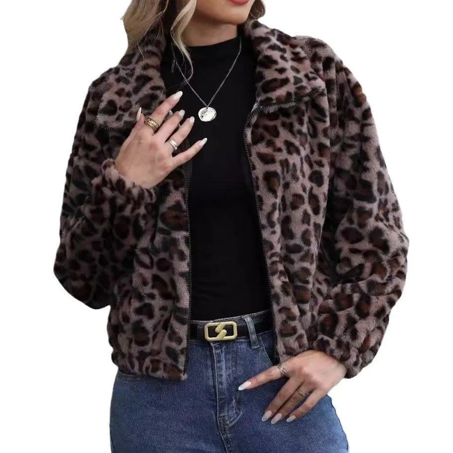 Women's loose-fit leopard print plush coat with a zip front and raglan sleeves laid flat.