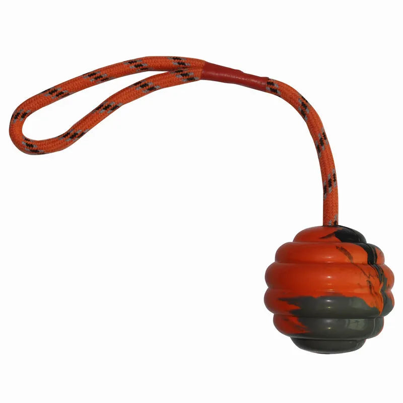 Rubber pet toy ball with rope knots in multiple colours for canine dental cleaning and training