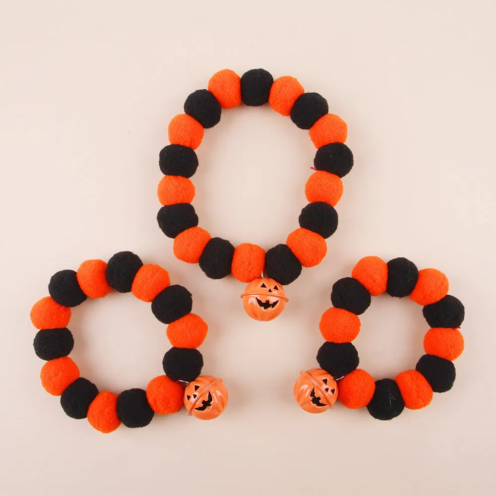 Orange Halloween pumpkin cat collar with breakaway safety buckle on adjustable polyester webbing