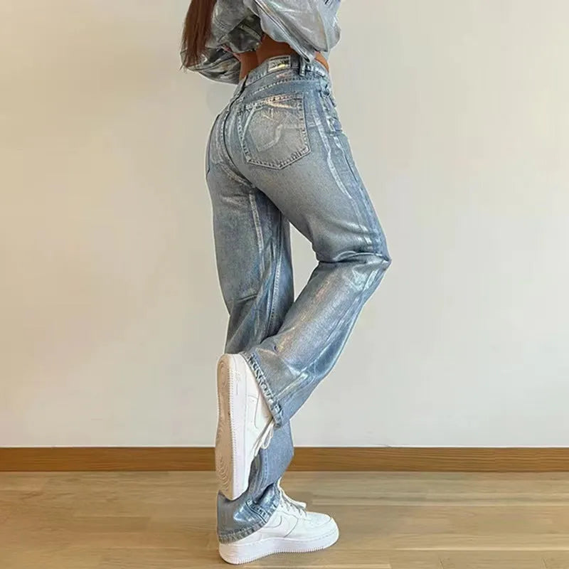 Women's washed blue high waist straight leg jeans with silver contrast details on back pockets