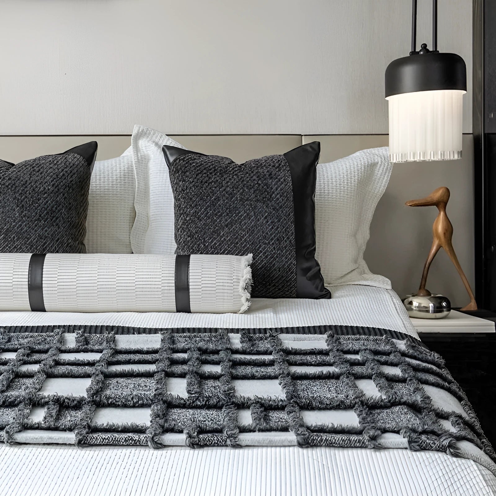 Polyester bed runner and nap blanket set with plaid pattern on bed with matching pillowcase and round pillow
