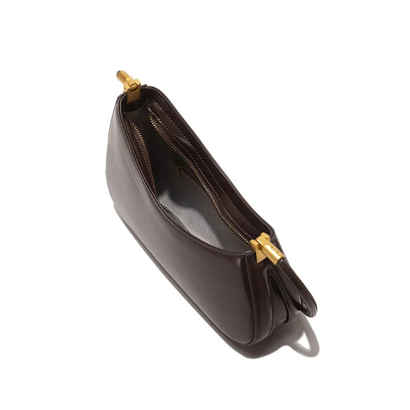 Women's oval retro underarm handbag in PU leather, shown in one of seven colours with a single strap and sewing line detail.
