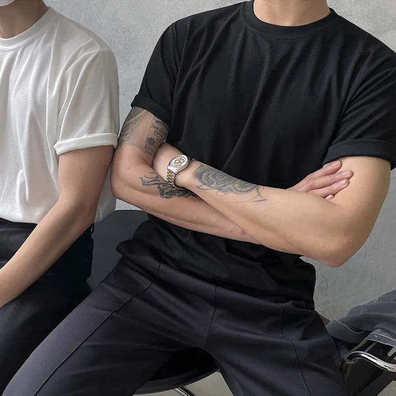 Men's slim fit cotton t-shirt in solid white colour showing round neck and half-length sleeves
