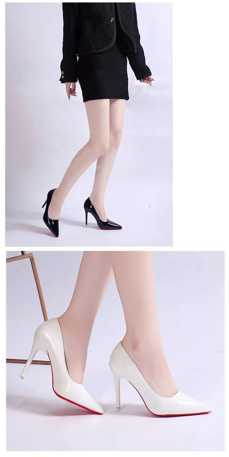 Women's black pointed toe stiletto pumps with a low-cut vamp and thin high heel on a white background.