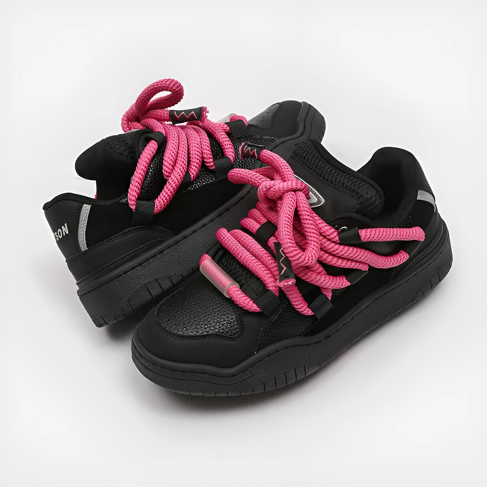 Casual low-top lace-up shoes in a solid colour with a round toe and thick rubber sole.