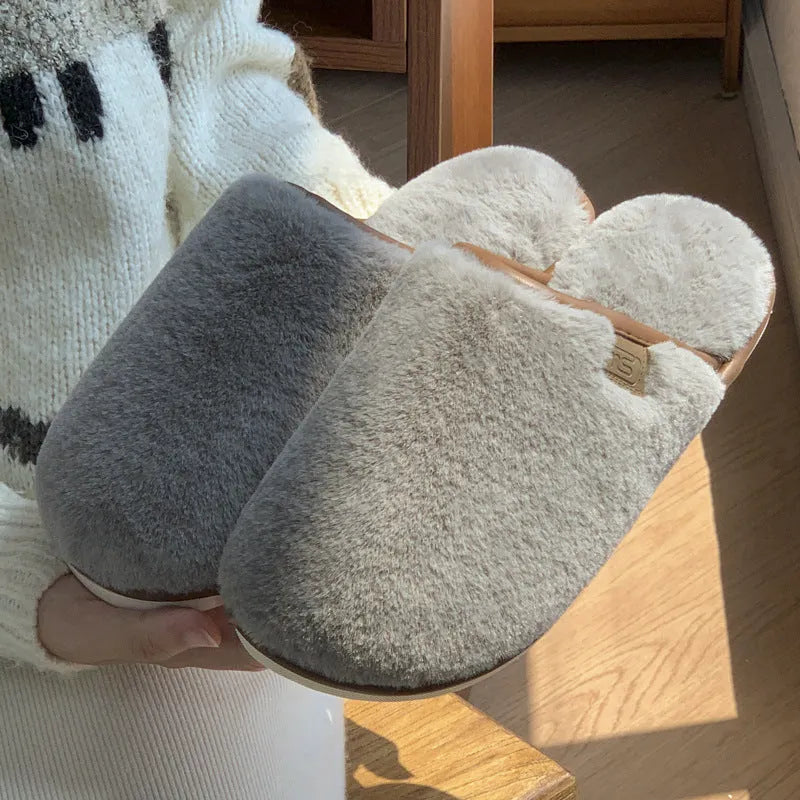 Winter plush slippers in solid colours with non-slip PVC soles and car stitching detail