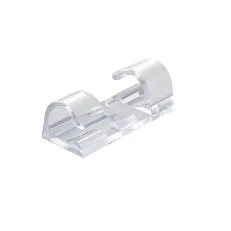 Transparent plastic self-adhesive wire routing clips for cable organisation