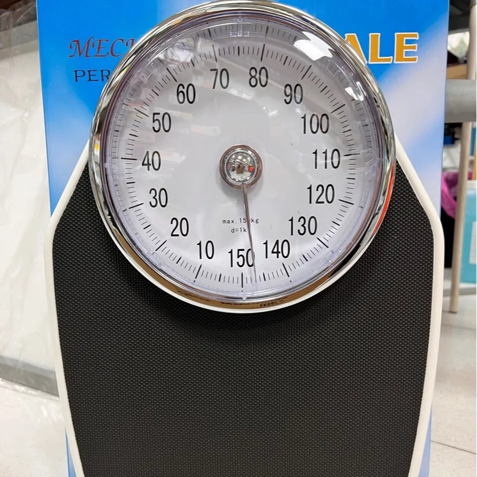 Black mechanical pointer body weight scale with large dial display measuring 47x35x11cm