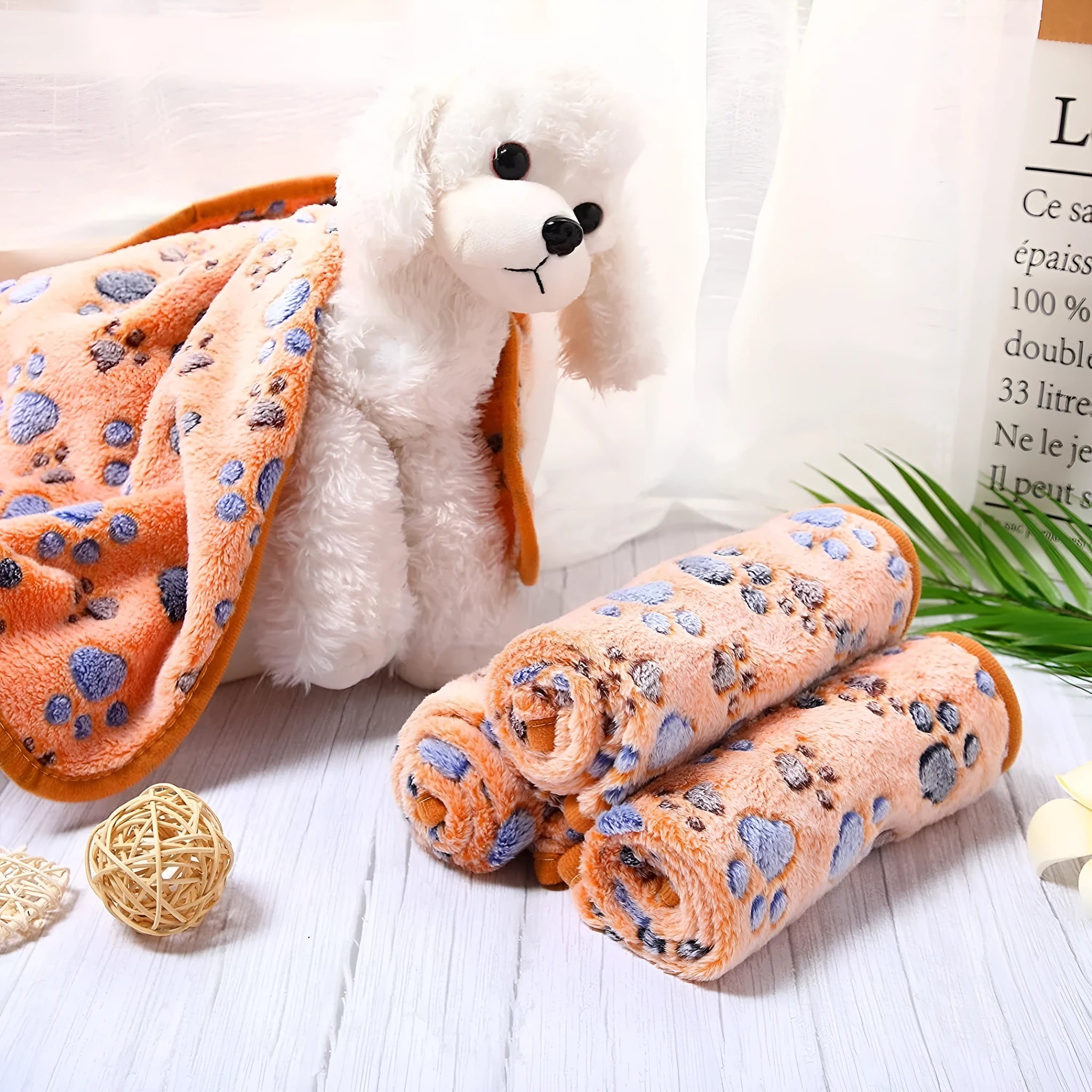 Coral fleece dog blanket with paw print design in multiple colour options