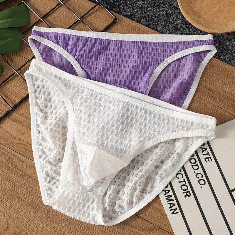 Men's low waist transparent visual underwear in nylon lace fabric showing breathable quick-drying construction