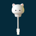Cartoon bear or rabbit USB LED night light with remote control on a bedside table