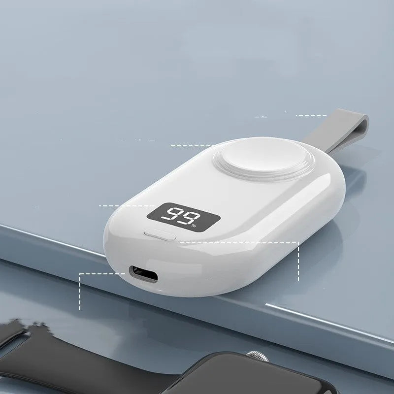 Black or white plastic wireless power bank for V5 smartwatches next to USB-C cable