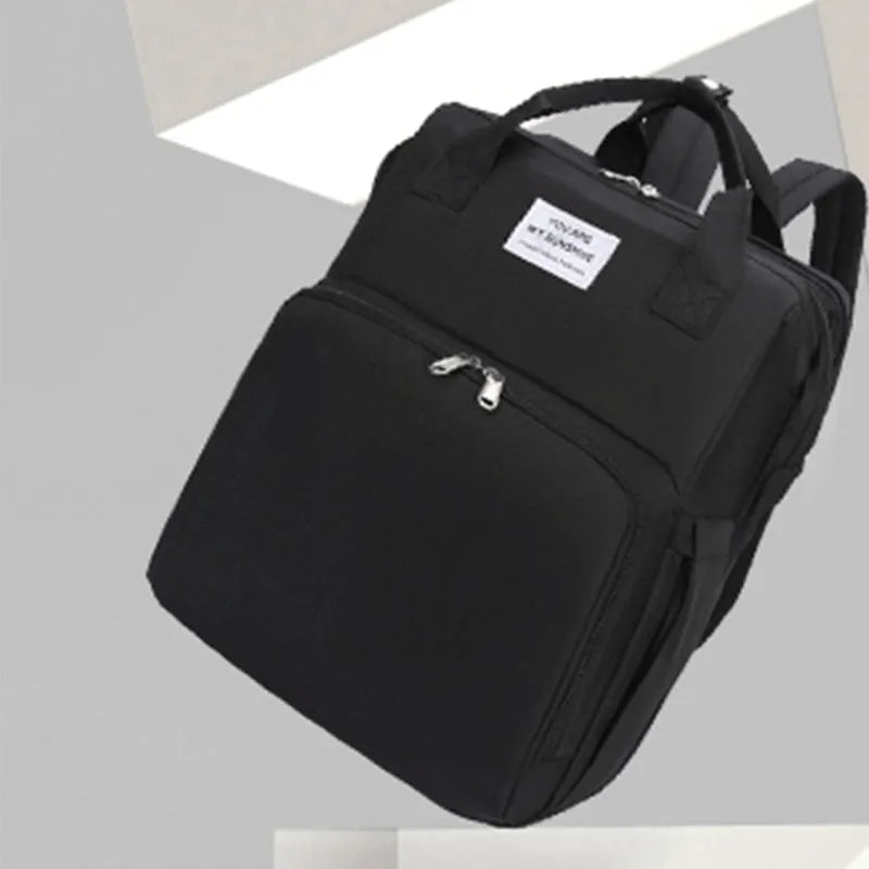 Portable folding mummy bag in multiple colours with curved shoulder strap and USB interface