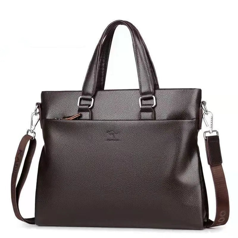 Men's black and brown PU leather business messenger bag with splicing design on a table.