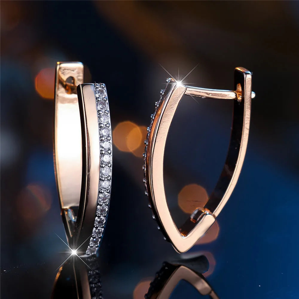 Women's V-shaped geometric ear clips with champagne gold electroplating and white diamond accents