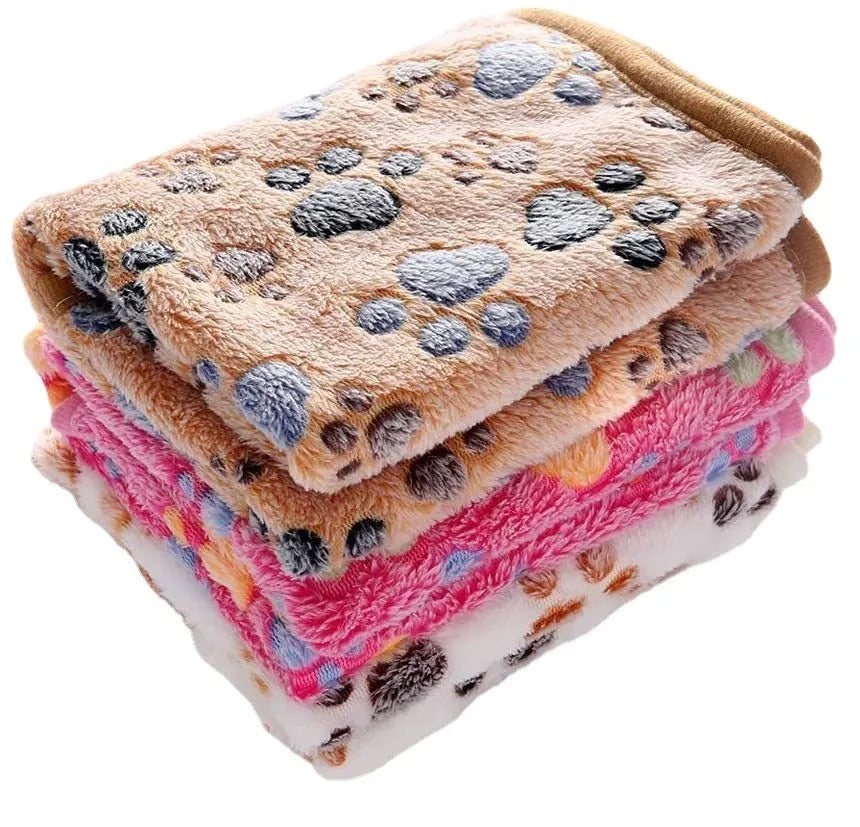 Coral fleece dog blanket with paw print design in multiple colour options