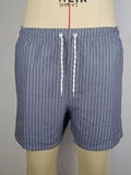 Polyester fibre beach shorts with digital printed striped triangle lining in straight leg style