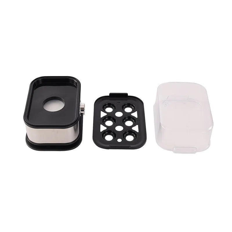 Black portable stainless steel mini egg boiler for kitchen and travel use.
