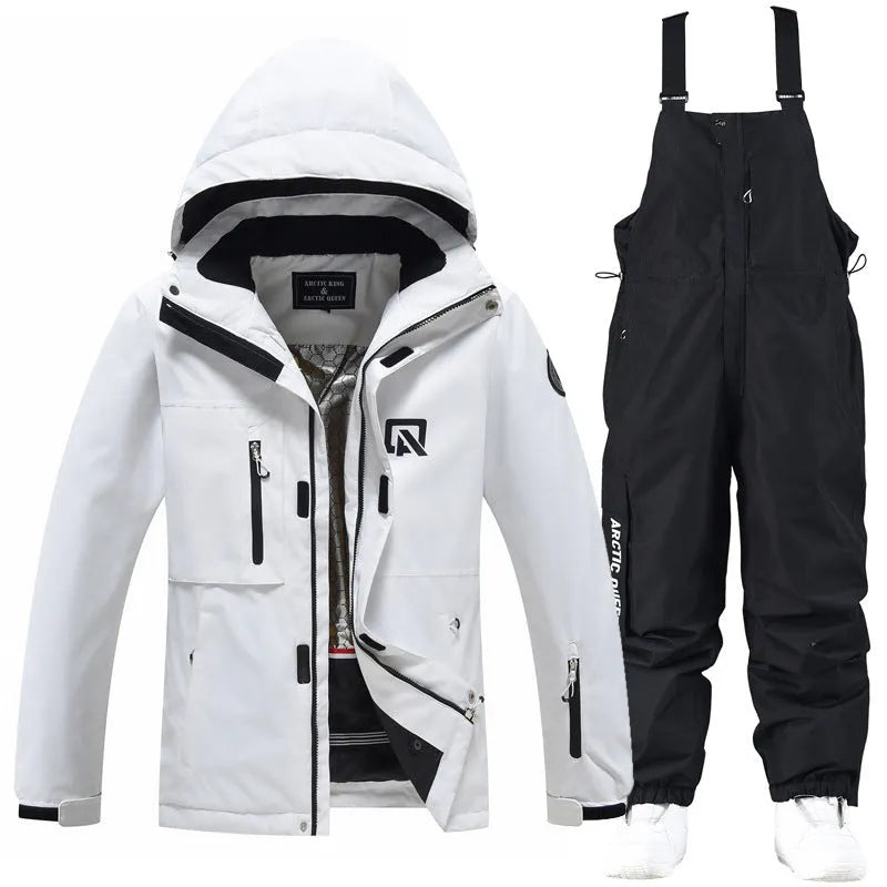 Men's and women's waterproof winter ski suit in blue top with grey blue trousers.