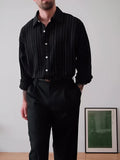 Black pinstriped polyester button-down shirt in regular fit with striped pattern