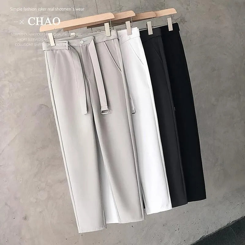 Boys slim straight wool trousers with tapered fit and straight leg opening in black colour