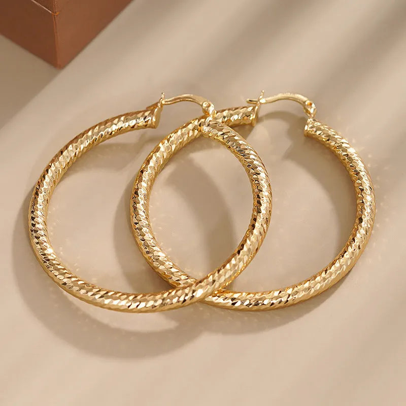 Copper geometric ring design ear clip earrings for women in assorted colours.