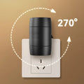 Small white induction night lamp with adjustable brightness and rotatable light head plugged into wall socket