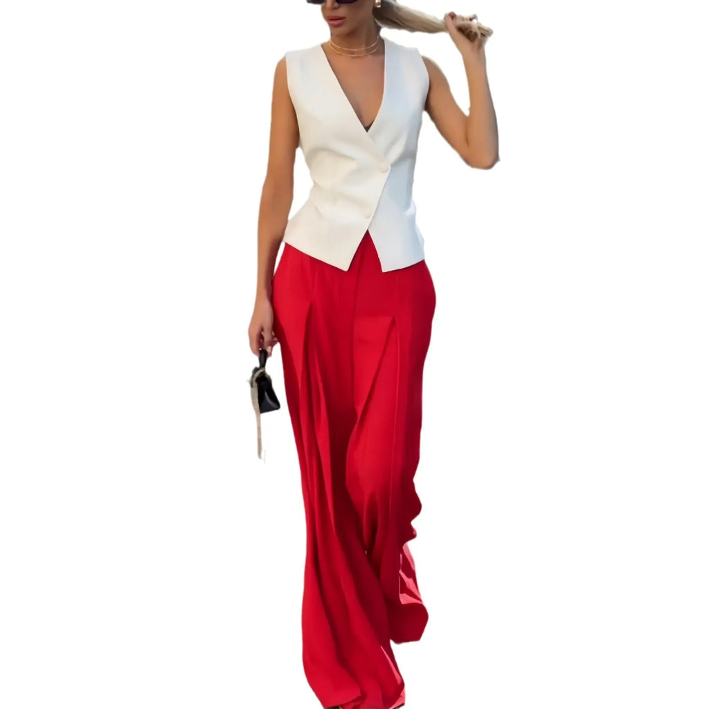 Beige women's two-piece set with deep V-neck sleeveless top and high-waist wide leg trousers