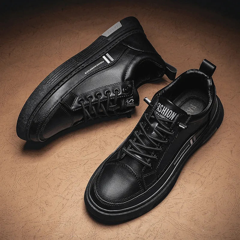 Men's white and black low-top skateboard shoes with elastic band fastening and rubber sole.