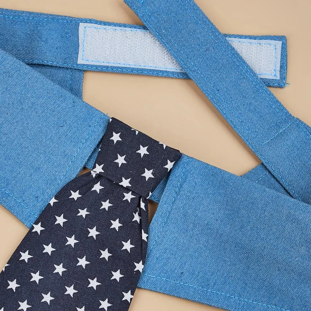 Blue denim adjustable dog collar with a black bow tie featuring white star patterns.