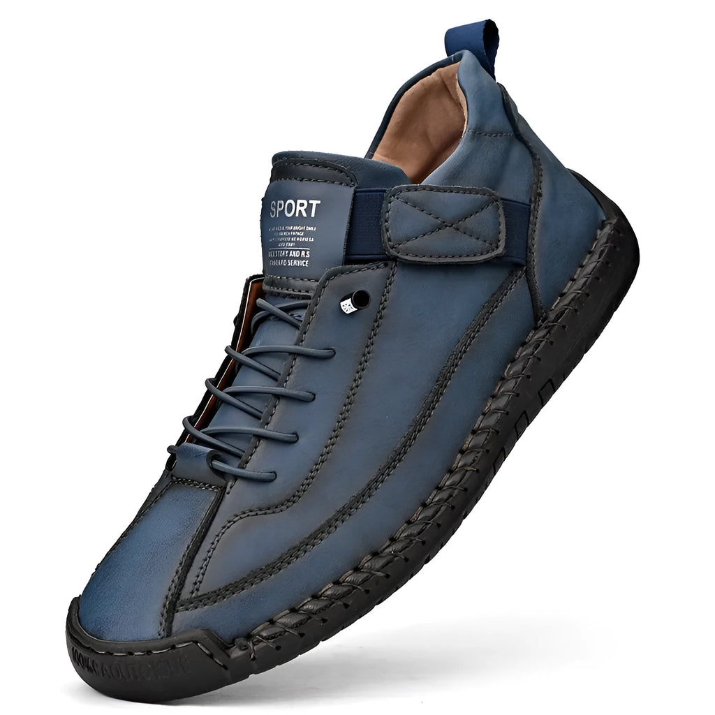 Men's mid-calf black Martin boots with tooling stitching and a flat rubber sole on a white background.