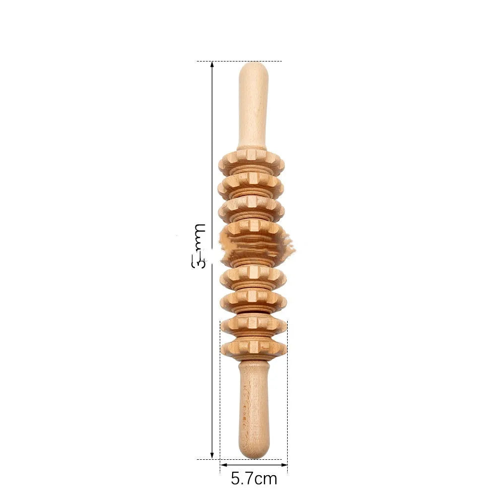 Assorted beech wood massage rollers including T-shaped and multi-wheel sets on a plain surface.